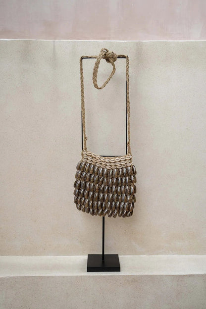 De Shell Purse Op Stand