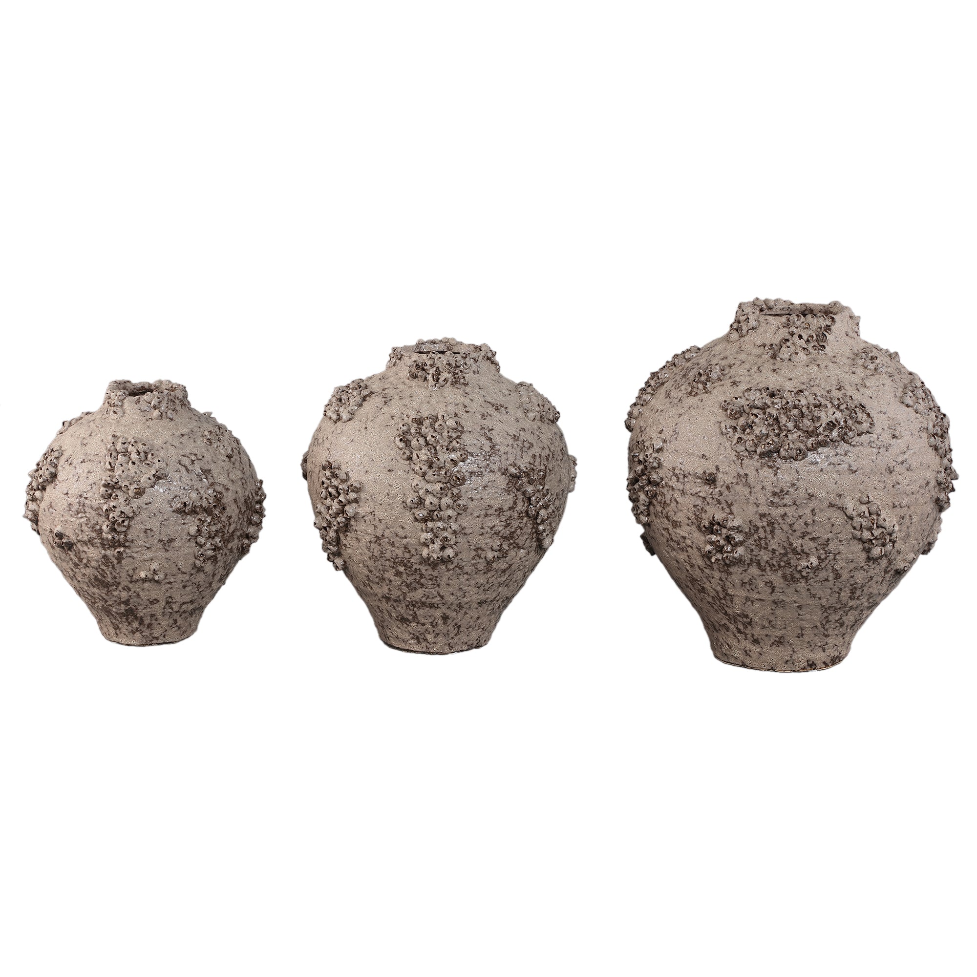 Deisy Beige Ceramic Jar Shaped Vase Rough Coral S van PTMD, bovenaanzicht van de vaas op witte achtergrond