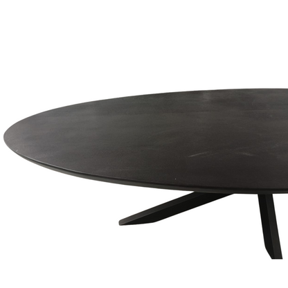 Detailopname van de rand van het zwarte tafelblad van de Brandy eettafel