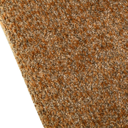 Close-up van de stofstructuur van de fauteuil Dilan Venga Cognac