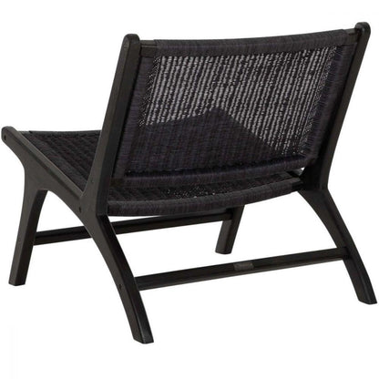 Fauteuil Lazy Loom Zwart van MUST Living van opzij, gebogen armleuningen van zwart papiergaren