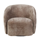 Fauteuil Yara Clay van Starfurn als leesplek bij het raam met een plaid over de armleuning