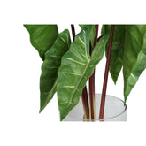 Groene kunstphilodendron van PTMD van opzij met brede glanzende bladeren