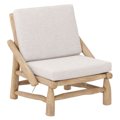 Blue Marlin fauteuil van MUST Living van opzij, met grillige takken in het onderstel