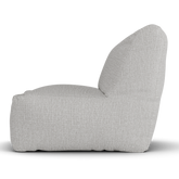 Laui Lounge loungestoel in ash grey van opzij, met rughoogte van 74 centimeter
