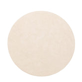 Salontafel Maroon rond 90cm schuin van opzij in een woonkamer