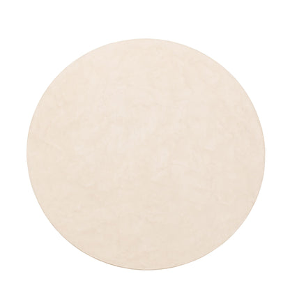 Salontafel Maroon rond 90cm schuin van opzij in een woonkamer