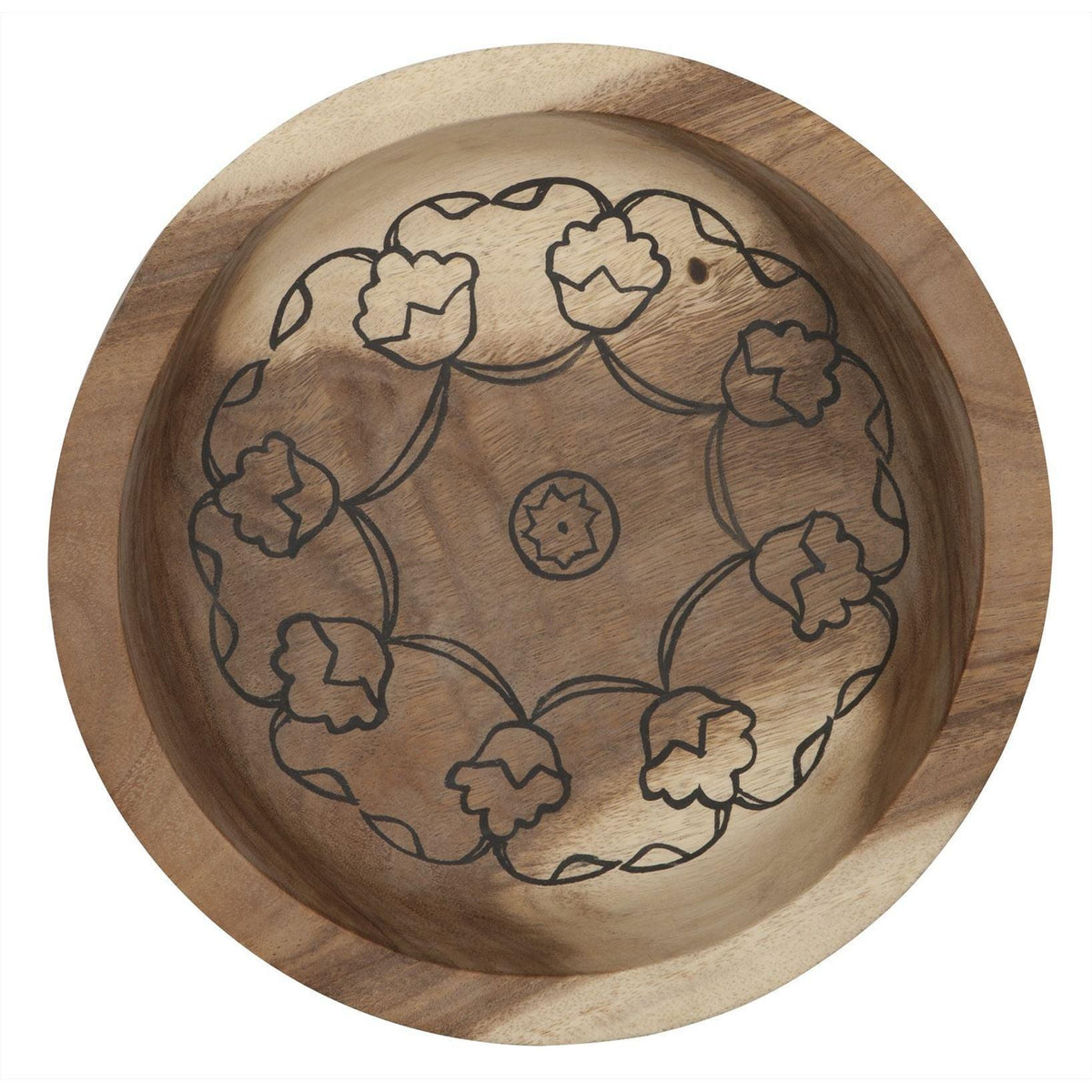 Detail van het handgesneden mandala motief in de teakhouten schaal van MUST Living