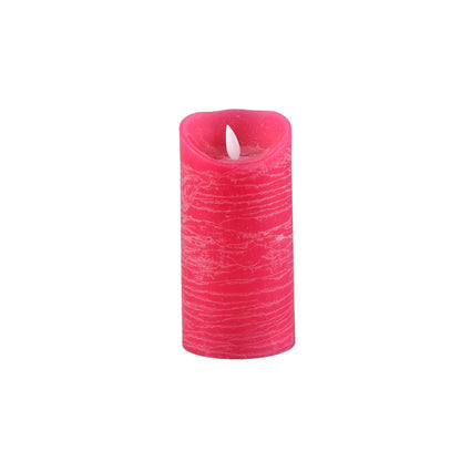 LED kaars maat M van PTMD in fel roze met rustieke wasstructuur