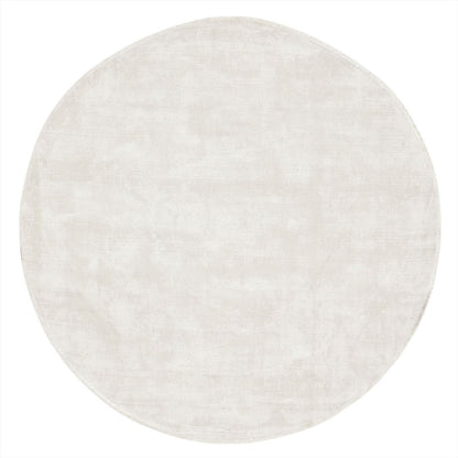 Rond vloerkleed La Belle van MUST Living in zandkleurige viscose met een doorsnede van 150 cm